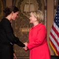 Hillary Clinton shakes hands with Elena Ambrosi