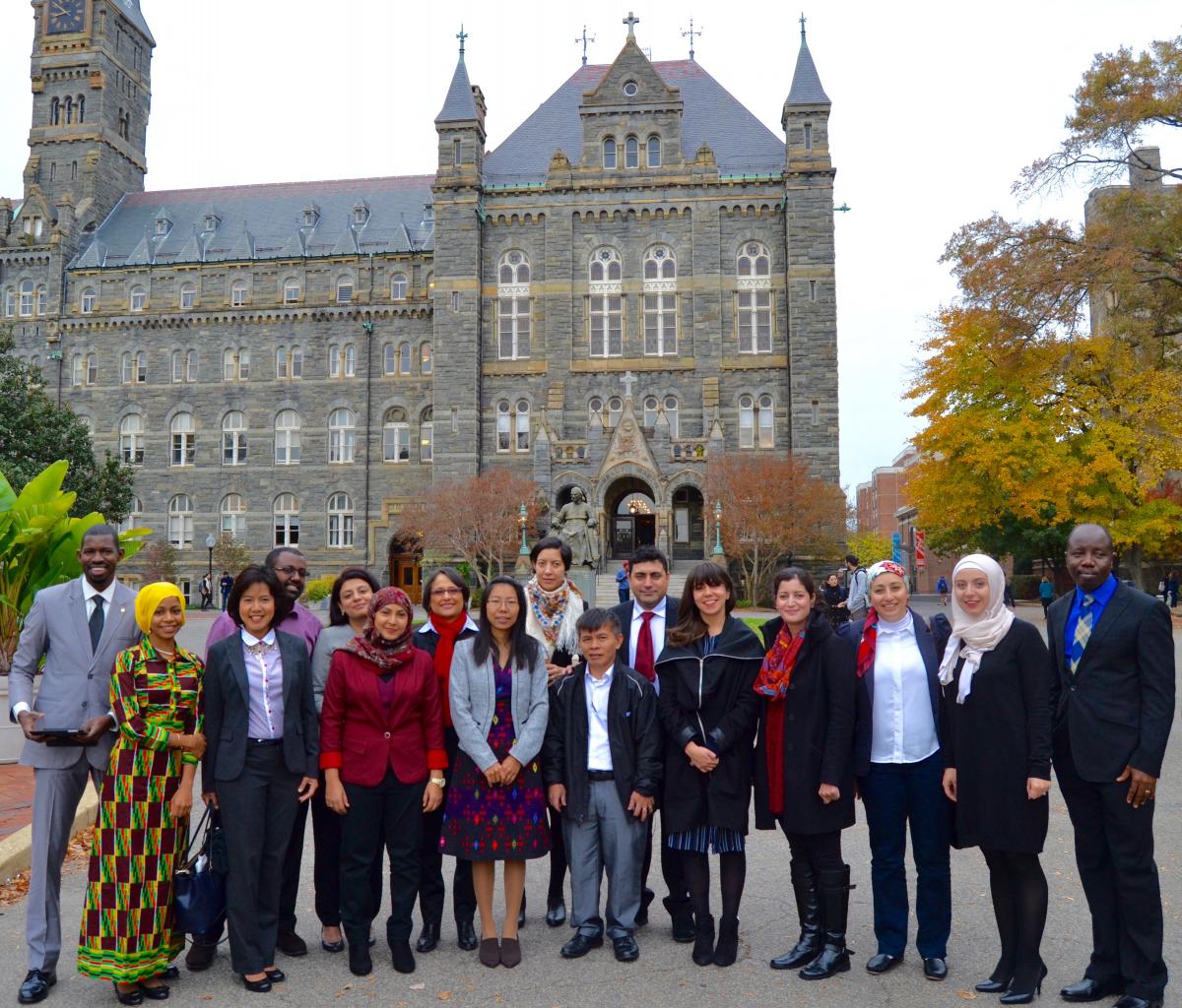 A group gathers outside of Georgetown University's Healey Hall