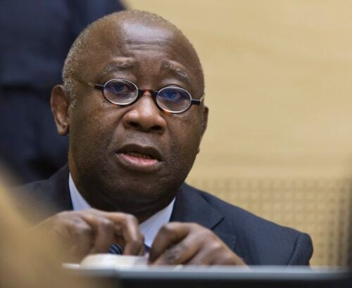 Former Ivory Coast President Laurent Gbagbo attends a confirmation of charges hearing in his pre-trial at the International Criminal Court in The Hague February 19, 2013. Gbagbo is charged with crimes against humanity committed during the 2011 civil war sparked by his refusal to accept the election victory of rival Alassane Ouattara. REUTERS/ Michael Kooren (NETHERLANDS)