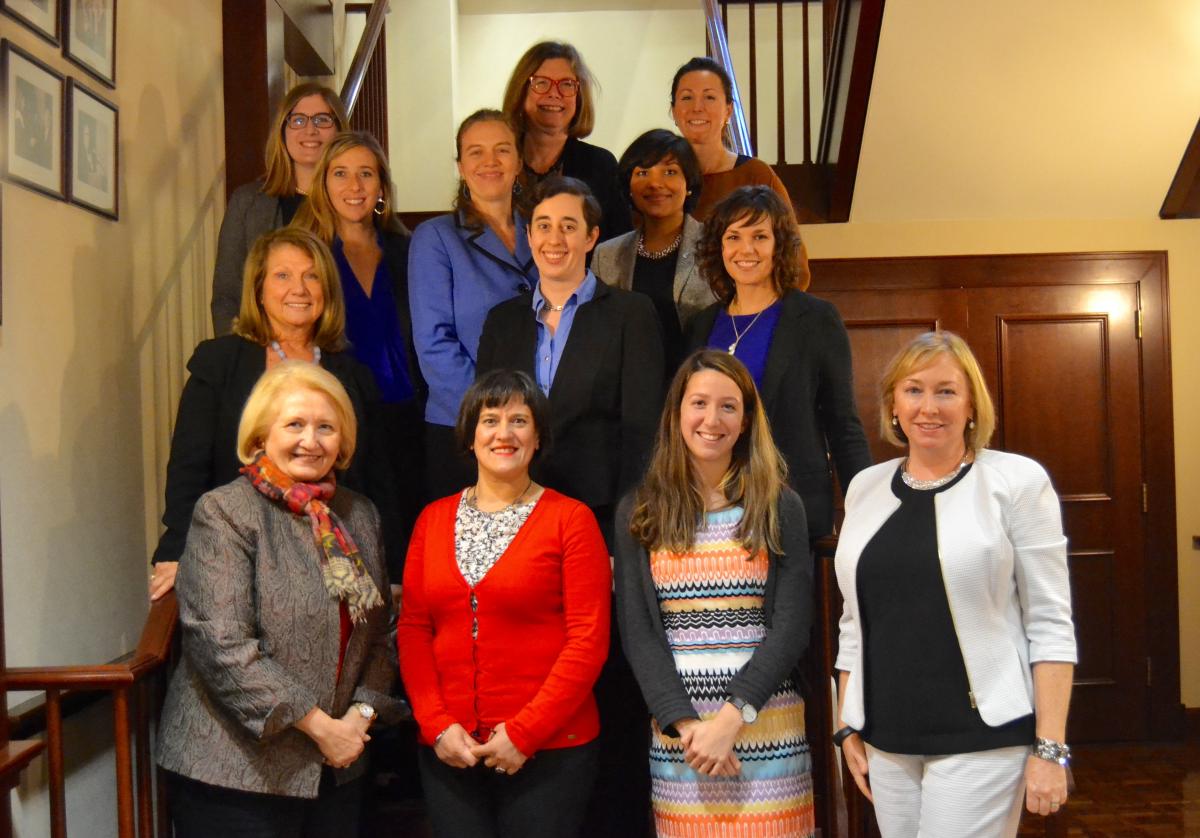 Ambassador Verveer and group of policy makers stand together