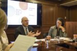 Dean Joel Hellman and Dr. Jeni Klugman speak at a Georgetown roundtable