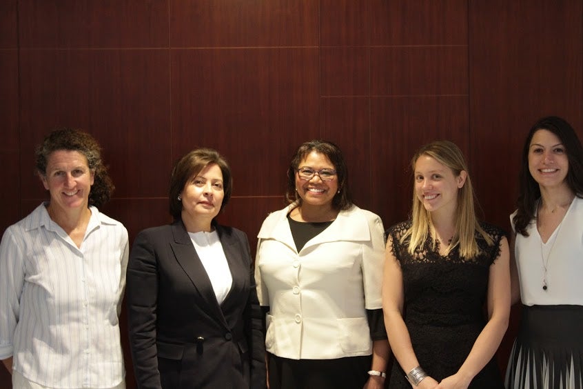 GIWPS' Sophie Huve stands with panelists at CSIS