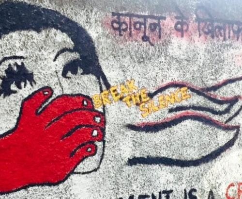 Mural in India with caption 