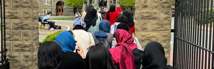 Afghan women leaders enter Georgetown's front gates.
