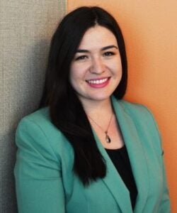 The photo is a professional headshot of Jennifer Grosman Fernández, one of the people mentioned in this post.